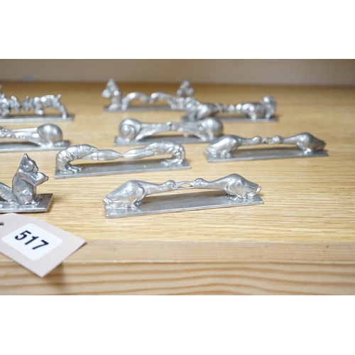 517 - A set of 12 French pewter novelty knife rests, in the form of squirrels, fish, snails, goats, etc.... 