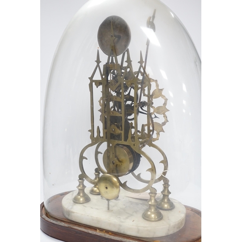 535 - A late 19th century skeleton clock, under glass dome, 44cm high .