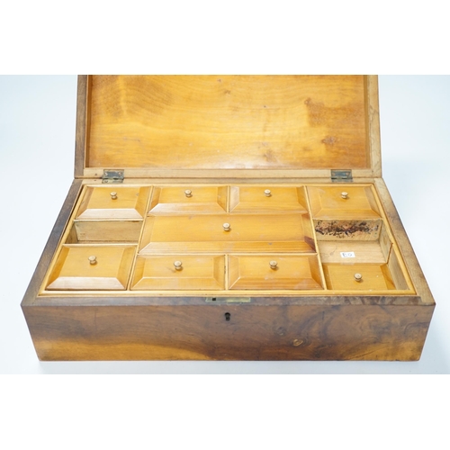 537 - A late 19th century walnut sewing box, inlaid with a Napoleonic sea fort to a central cartouche on t... 