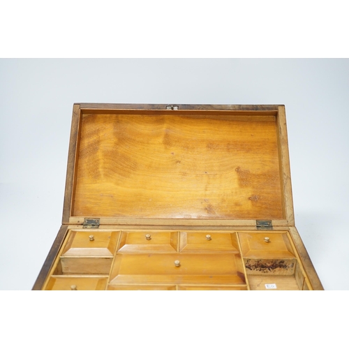 537 - A late 19th century walnut sewing box, inlaid with a Napoleonic sea fort to a central cartouche on t... 