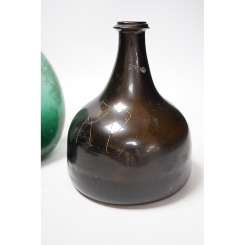 538 - An 18th century black glass mallet form bottle with neck rim, 17cm and an 18th century Persian green... 