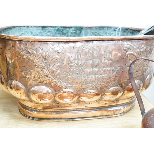 540 - An 18th century Dutch beaten copper planter of elongated form with lion mask handles, beaten ship de... 