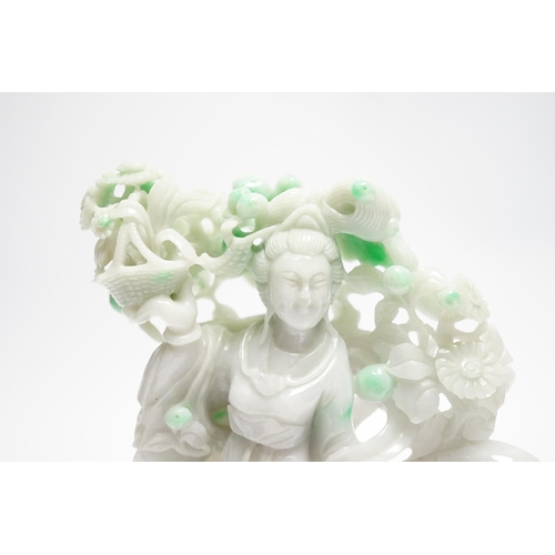 548 - A Chinese jadeite figure of He Xiangu on carved stand, 17cm high