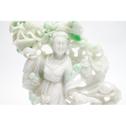 548 - A Chinese jadeite figure of He Xiangu on carved stand, 17cm high