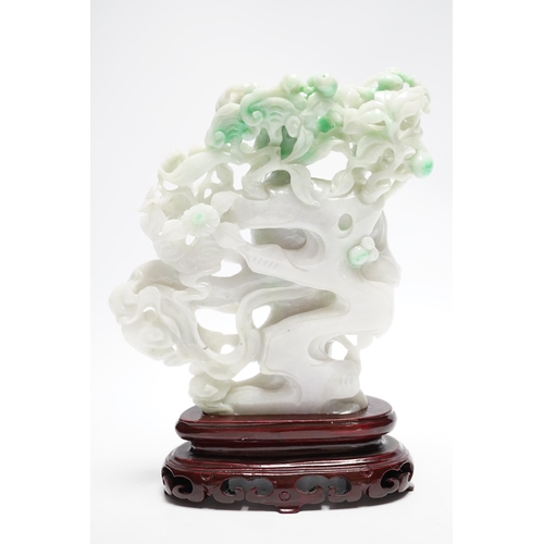 548 - A Chinese jadeite figure of He Xiangu on carved stand, 17cm high