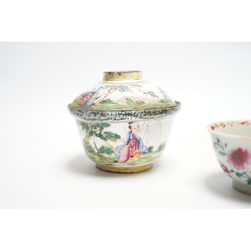 553 - A Chinese Canton enamel tea bowl and cover, and a porcelain tea bowl, largest 8cm high