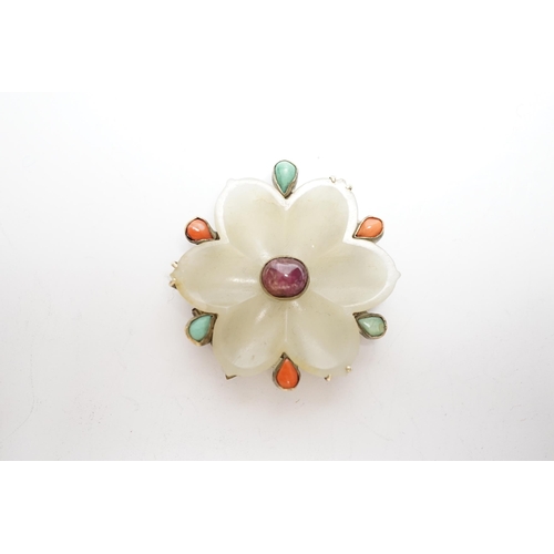 569 - A Chinese jade and gem mounted clip, the jade flowerhead Yuan - Ming dynasty