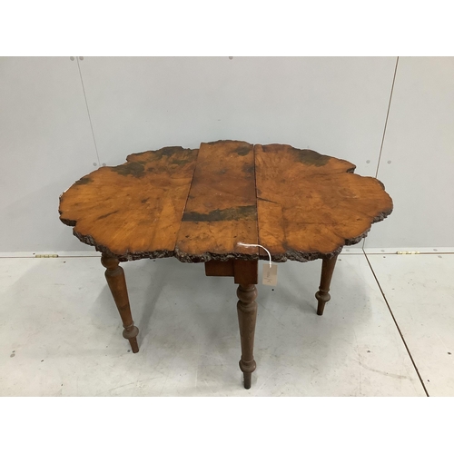 57 - A Provincial waney edge Sutherland table, width 77cm, depth 26cm, height 61cm