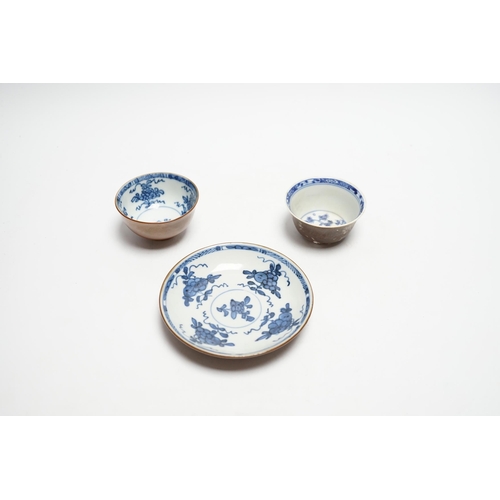 573 - A Chinese Nanking cargo type tea bowl, another tea bowl and saucer, Qianlong period