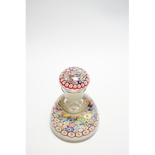 577 - A Paul Ysart close packed millefiori glass inkwell or bottle and stopper, Caithness period, scratche... 