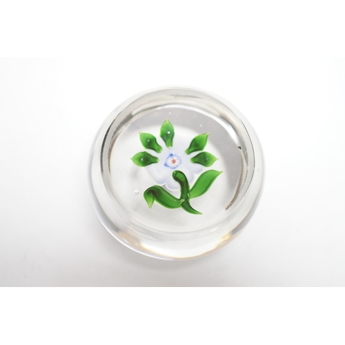 580 - A Baccarat blue flower paperweight, 6cm