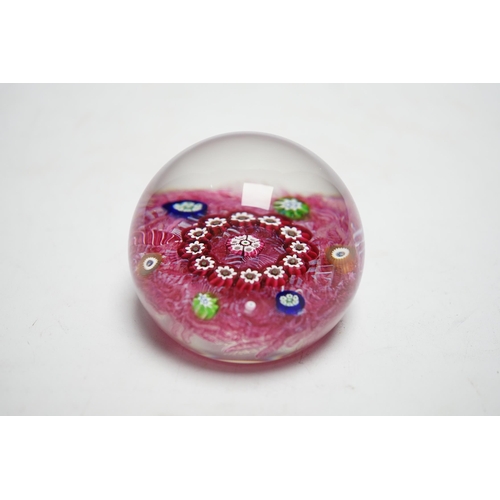 586 - A Paul Ysart millefiori garland glass paperweight, Harland period, H cane, with scrambled pink lat... 