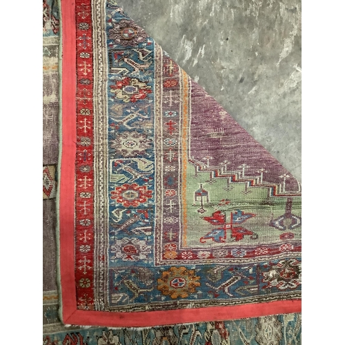 59 - An antique Turkish prayer rug, 168 x 111cm