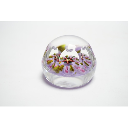 595 - A Paul Ysart faceted flower glass paperweight, Harland period, the central flower within aventurin... 