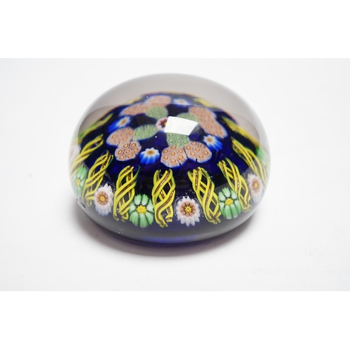 597 - A Paul Ysart millefiori glass paperweight, pre-war Moncrieff period, with central complex canes with... 