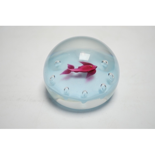 599 - A Paul Ysart fish glass paperweight, Harland period, opaque white ground, H cane, paper label, 7... 