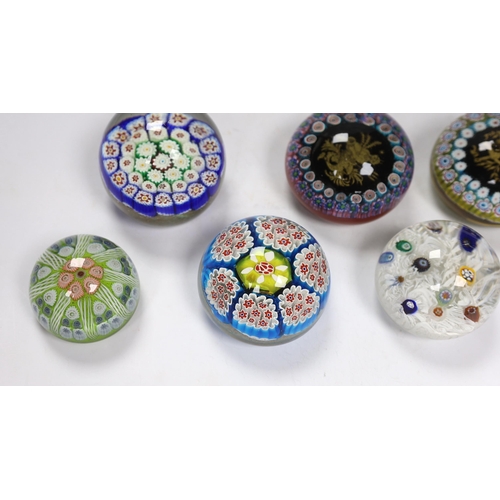 609 - Seven various glass millefiori paperweights, Murano etc.