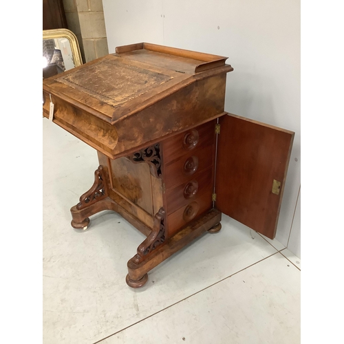 67 - A Victorian walnut Davenport, width 57cm, depth 56cm, height 64cm