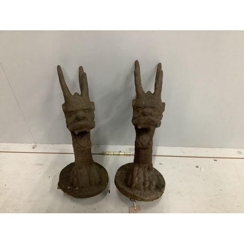 73 - A pair of Victorian cast iron dragon head finials, height 36cm