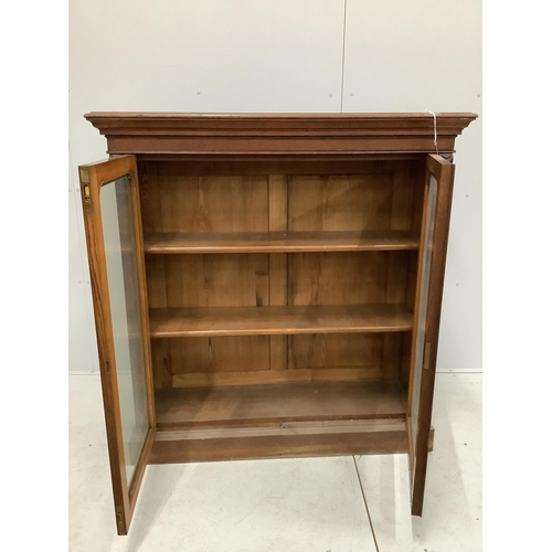 74 - A Victorian glazed oak bookcase, width 118cm, depth 40cm, height 124cm