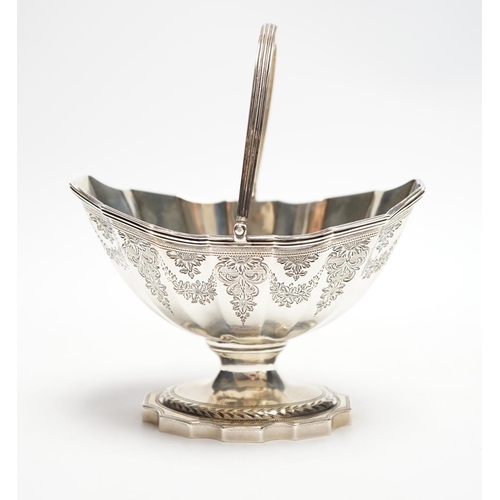 829 - A George III silver boat shaped pedestal sugar basket, John Hutson, London, 1788, length 13.2cm, 5.6... 