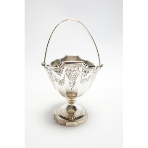 829 - A George III silver boat shaped pedestal sugar basket, John Hutson, London, 1788, length 13.2cm, 5.6... 