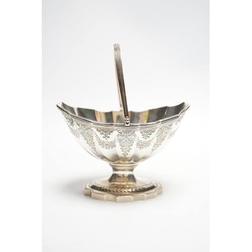 829 - A George III silver boat shaped pedestal sugar basket, John Hutson, London, 1788, length 13.2cm, 5.6... 