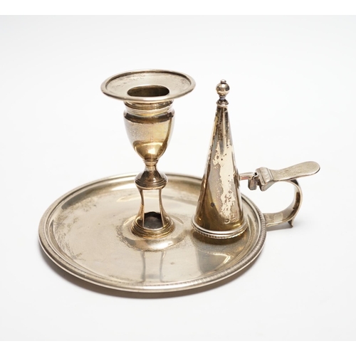 831 - A George III silver chamberstick, John Mewburn, London, 1801, with extinguisher(marks rubbed), diame... 