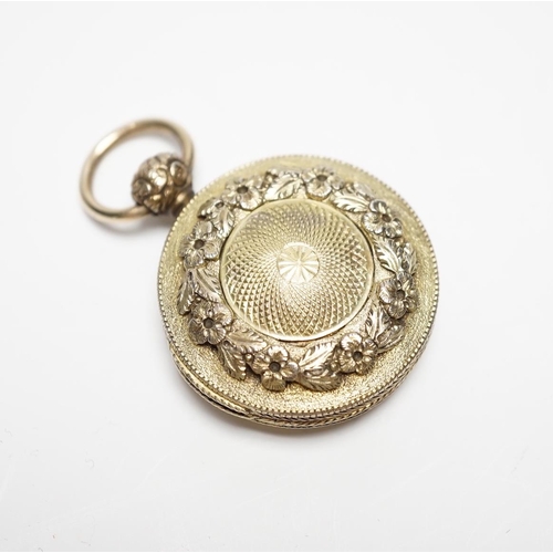 834 - A George III engine turned two colour silver gilt circular vinaigrette, maker, GW, both sides with m... 