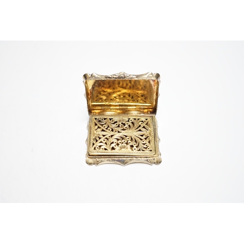 837 - An early Victorian engraved silver gilt vinaigrette, by Nathaniel Mills, Birmingham, 1842, 46mm, wit... 