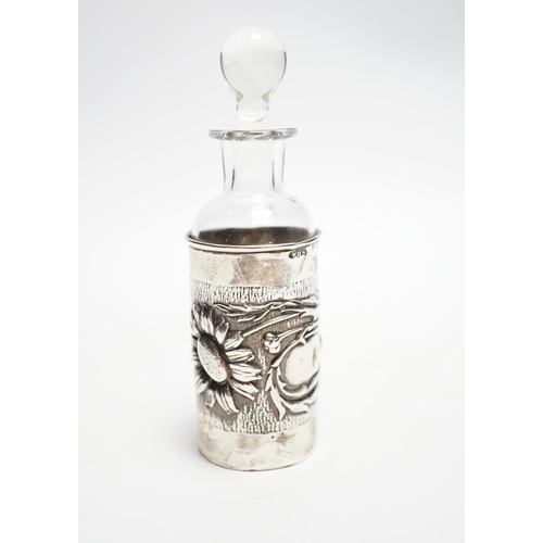 846 - An Edwardian Art Nouveau silver mounted glass scent  scent bottle and stopper, William Henry Sparrow... 