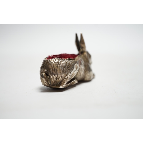 853 - An Edwardian novelty silver mounted pin cushion, modelled as a recumbent rabbit, Henry Matthews, Bir... 