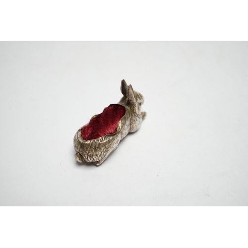 853 - An Edwardian novelty silver mounted pin cushion, modelled as a recumbent rabbit, Henry Matthews, Bir... 