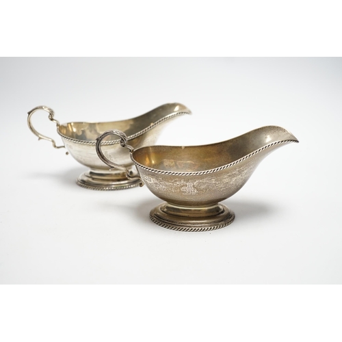 861 - A pair of George V silver oval pedestal sauceboats, London, 1917, 19cm length, 10.6oz.