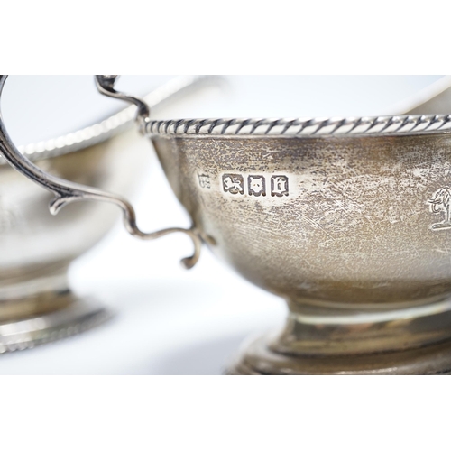 861 - A pair of George V silver oval pedestal sauceboats, London, 1917, 19cm length, 10.6oz.