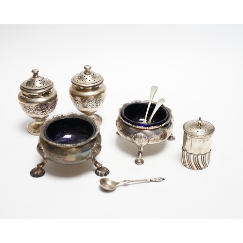 868 - Two Georgian silver bun salts and three other silver condiments.