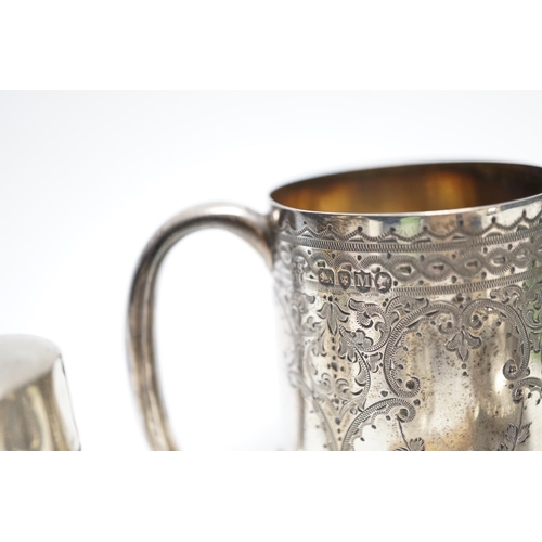 869 - A Victorian engraved silver christening mug, Charles Stuart Harris, London, 1887, 71mm and other ite... 