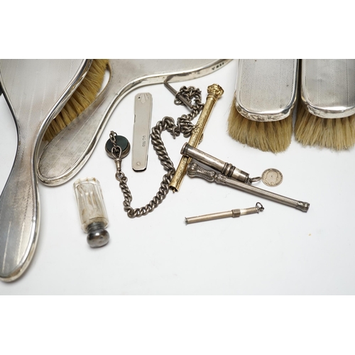 877 - Sundry silver and other items including a four piece mirror and brush set, propelling pencils, silve... 