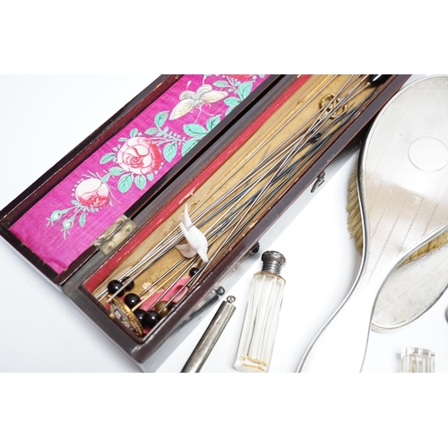 877 - Sundry silver and other items including a four piece mirror and brush set, propelling pencils, silve... 