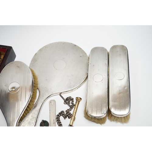 877 - Sundry silver and other items including a four piece mirror and brush set, propelling pencils, silve... 