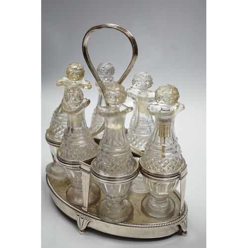 879 - A George III silver mounted oval cruet stand, maker P?, London, 1802, with reeded ring handle and ga... 