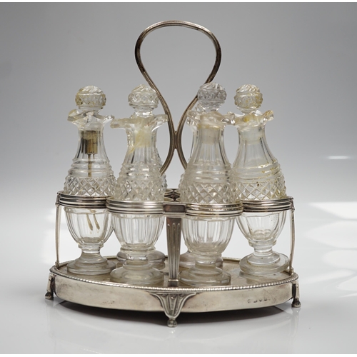 879 - A George III silver mounted oval cruet stand, maker P?, London, 1802, with reeded ring handle and ga... 