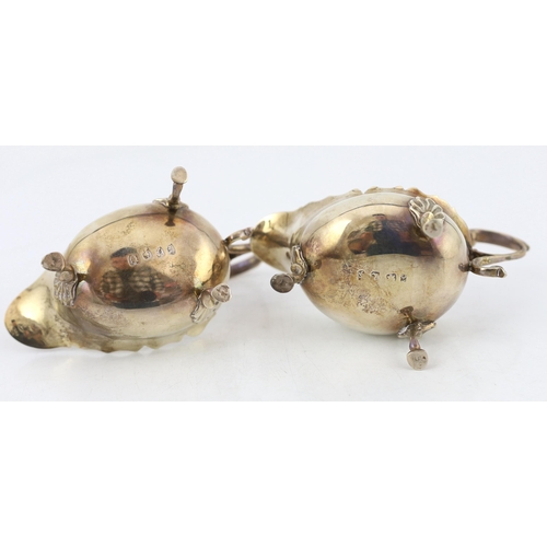 881 - A pair of late George II silver small sauce boats, by Robert Albin Cox, with cut rims and flying scr... 