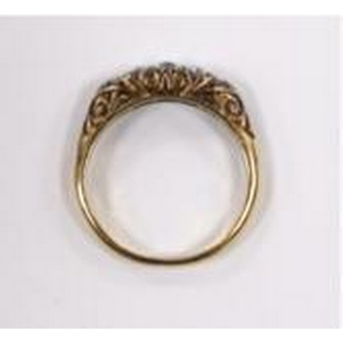 902 - An 18ct and graduated five stone diamond set half hoop ring, size M, gross weight 3.4 grams.