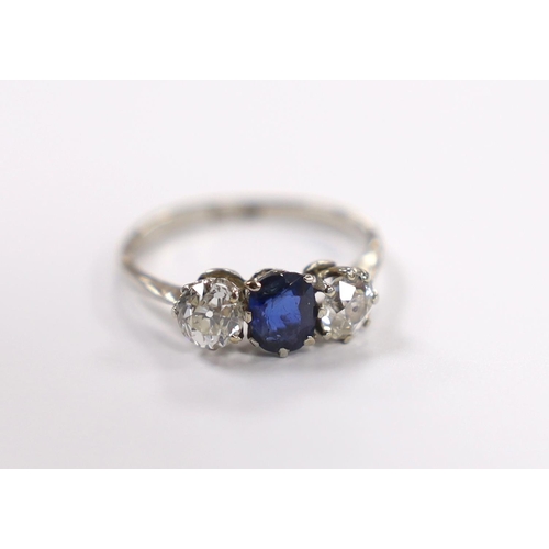 904 - An early to mid 20th century white metal (stamped plat), single stone sapphire and two stone diamond... 