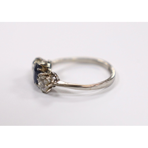 904 - An early to mid 20th century white metal (stamped plat), single stone sapphire and two stone diamond... 