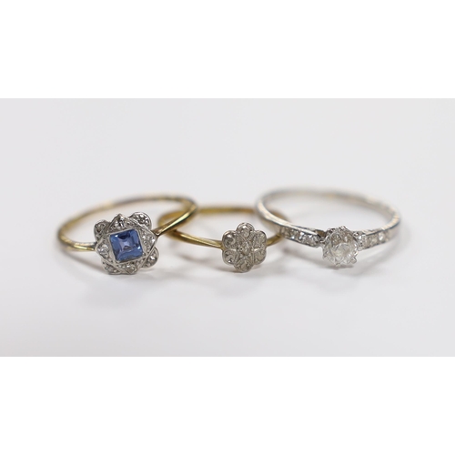 910 - A white metal and single stone diamond ring, with diamond chip set shoulders, size N and two 1920's ... 