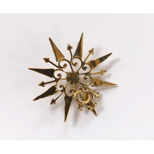 919 - A yellow metal, rose cut diamond and seed pearl set starburst pendant, 27mm, gross weight 1.9 grams.... 