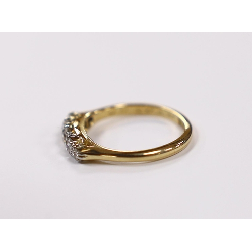 922 - A 1920's 18ct, plat and graduated five stone diamond set half hoop ring, size K/L, gross weight 2.6 ... 