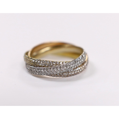 923 - A three colour yellow metal and pave set diamond triple band 'Russian' wedding ring, size Q, gross w... 